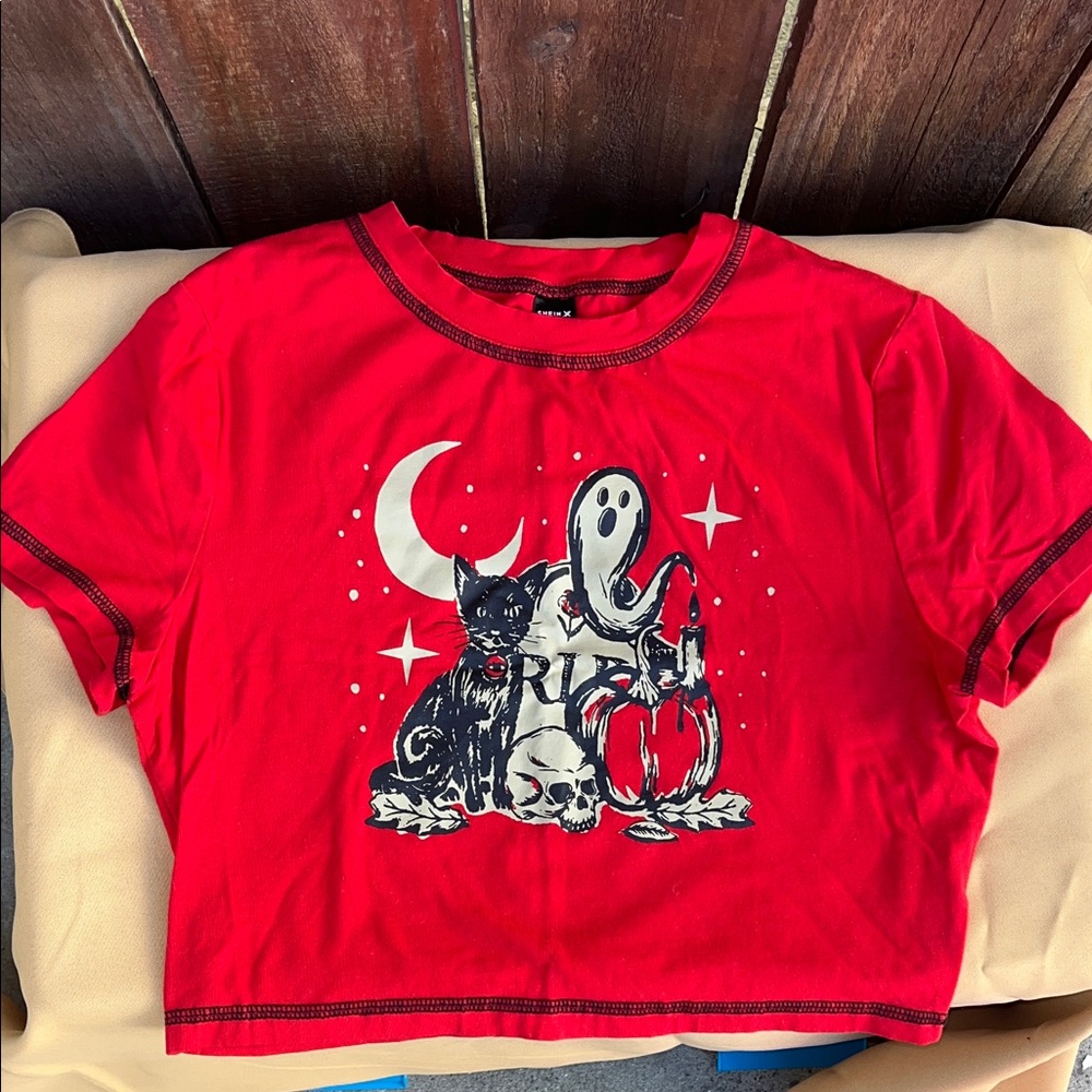Spooky woman’s red crop top